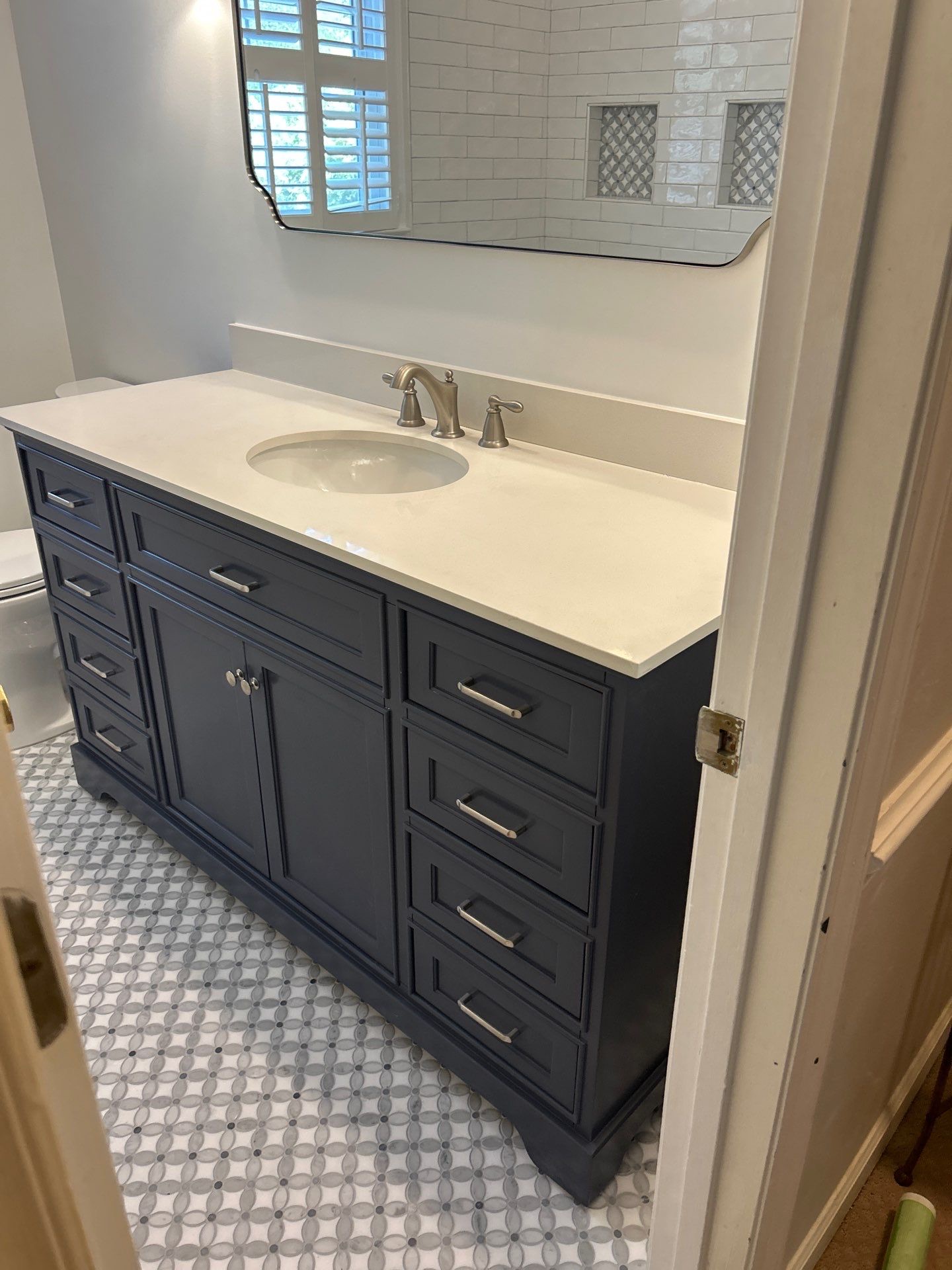 Navy Vanity &amp; Mosaic Floor